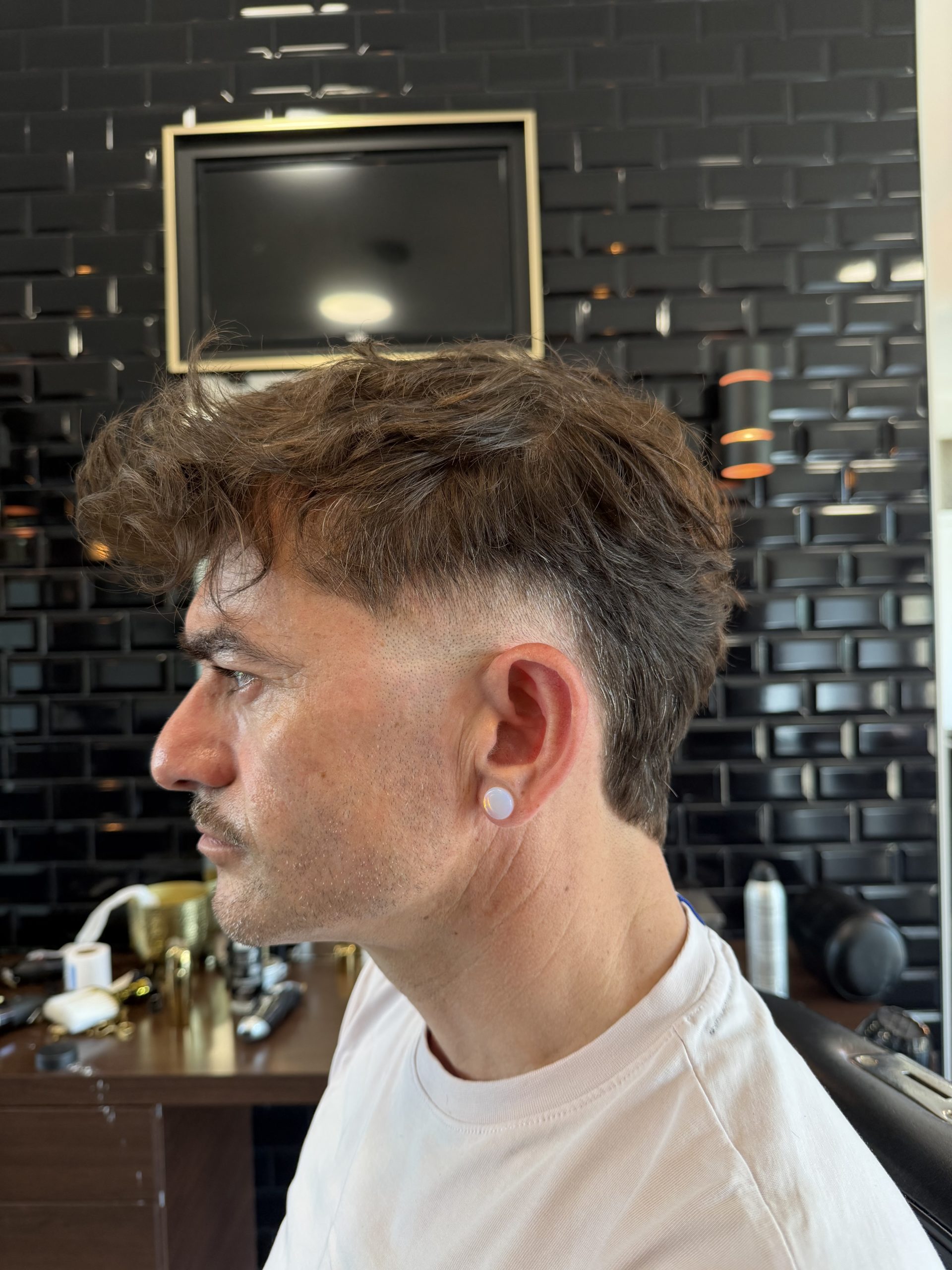 Coupe homme dégradé au salon For Men